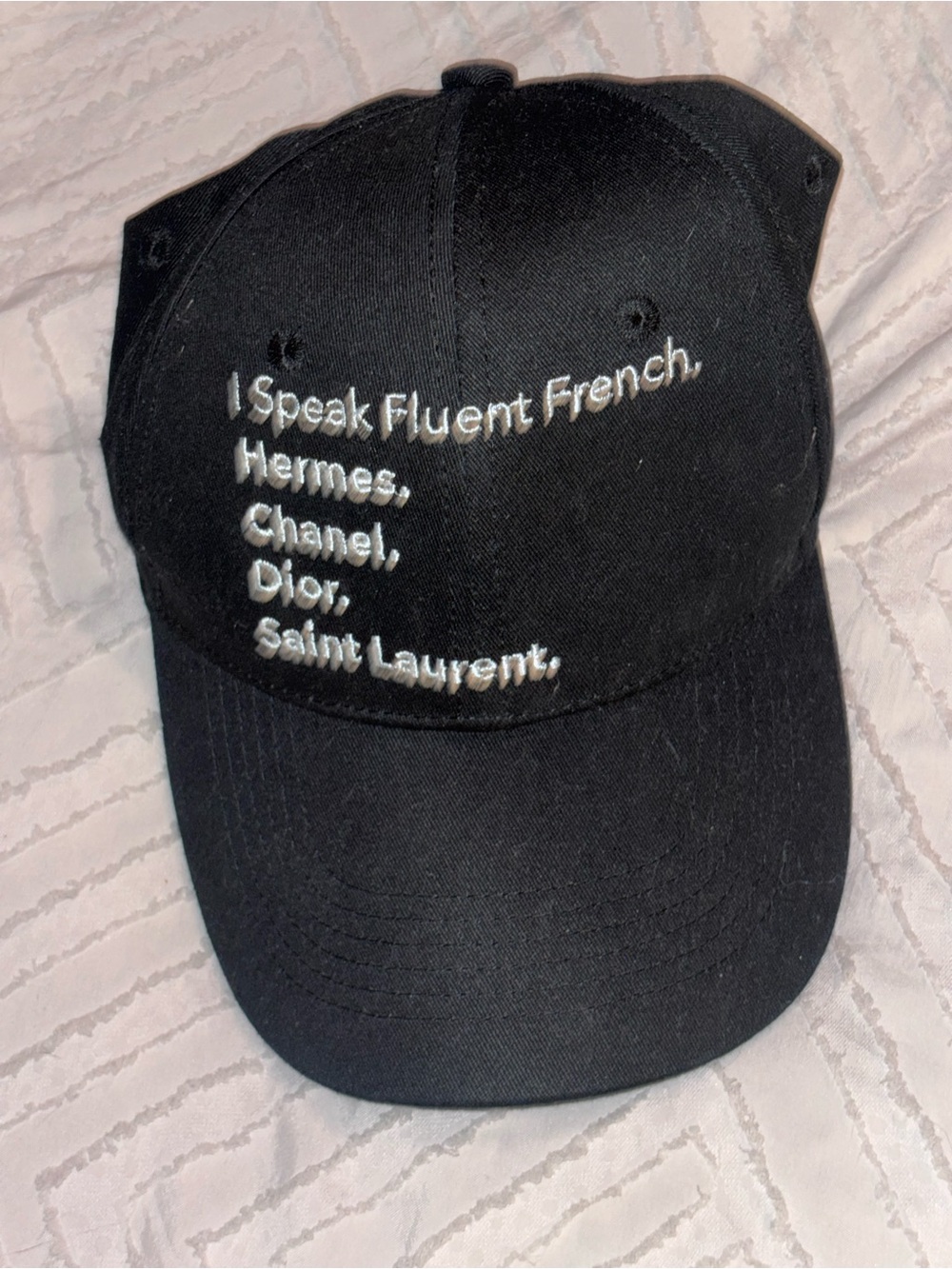 Black Baseball Cap with White Embroidered Designer Text